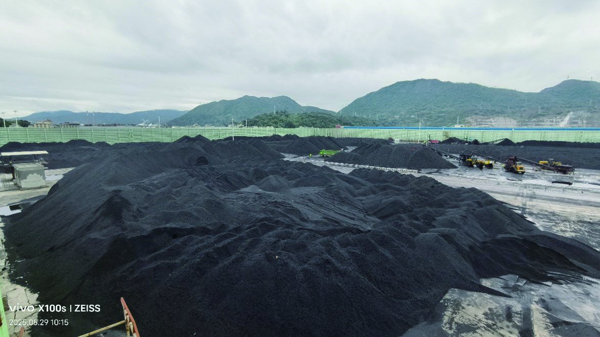 Coal stockpiles in an open storage yard