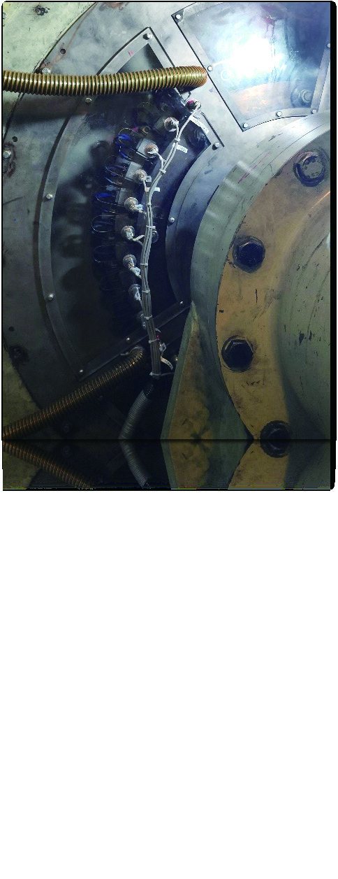 Carbon brush gear and slip ring assembly on a hydro generator