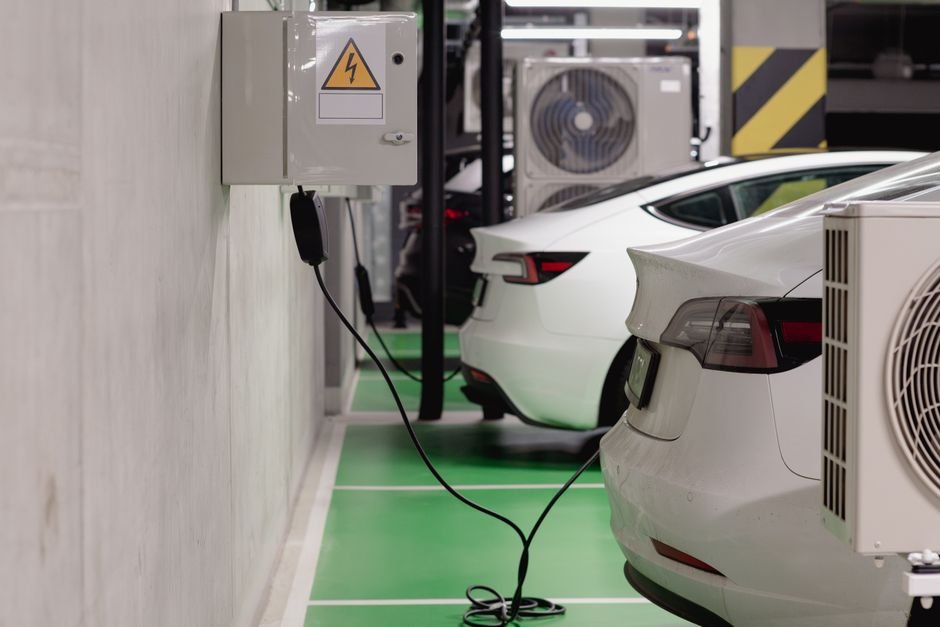 Electric vehicles charging at a fast-charging station